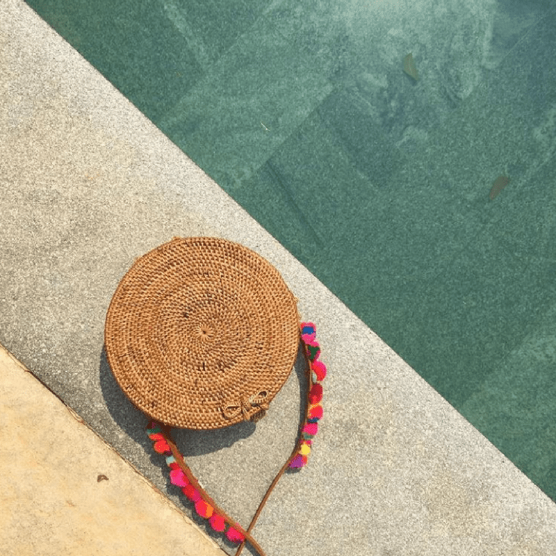 sac rond bikind bali osier raphia pompoms.png