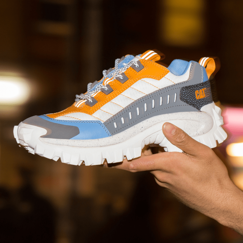 cat-footwear-intruder-sneakers-yellow-blue.png